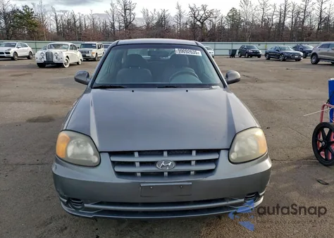 2003 Hyundai Accent Gl z USA, uszkodzony, nr VIN KMHCG35C83U266355